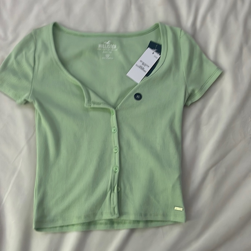 light green hollister baby tee with buttons